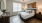 Bedroom with wood floors and natural lighting