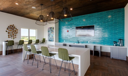 Take advantage of all The Huntley has to offer Outside summer kitchen with exquisite blue wall,